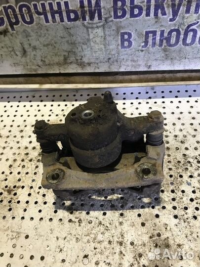 Суппорт тормозной передний левый Peugeot 107