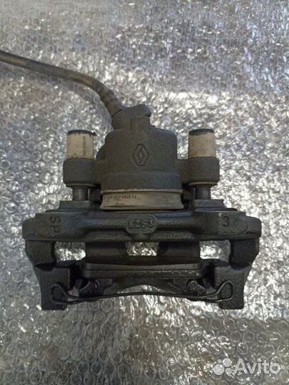 Суппорт тормозной передний левый Renault Logan L8