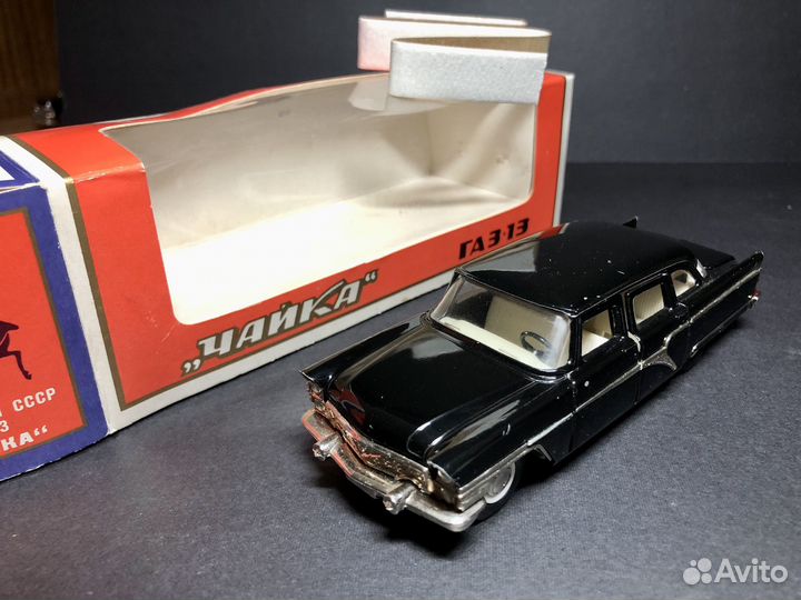 Газ 13 Чайка олимпийская 1:43 модель СССР