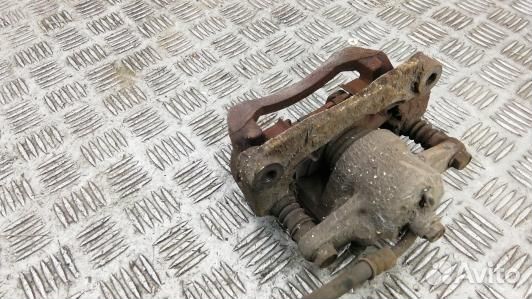 Суппорт тормозной задний левый subaru legacy 5 (92