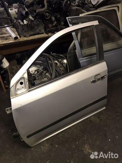 Geely MK Cross дверь передняя левая