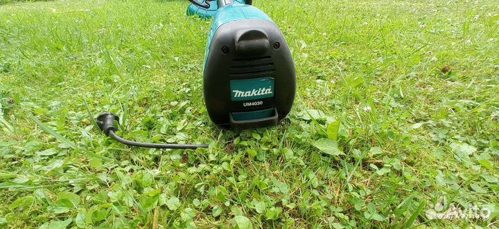 Триммер электрический makita