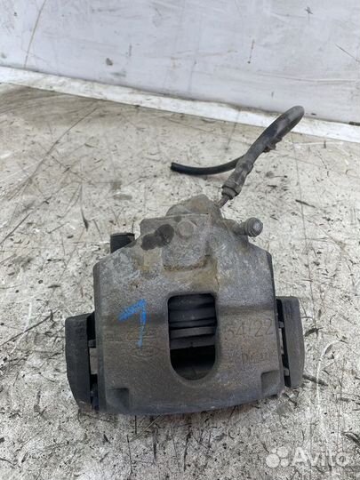 Суппорт тормозной передний левый Ford Fusion