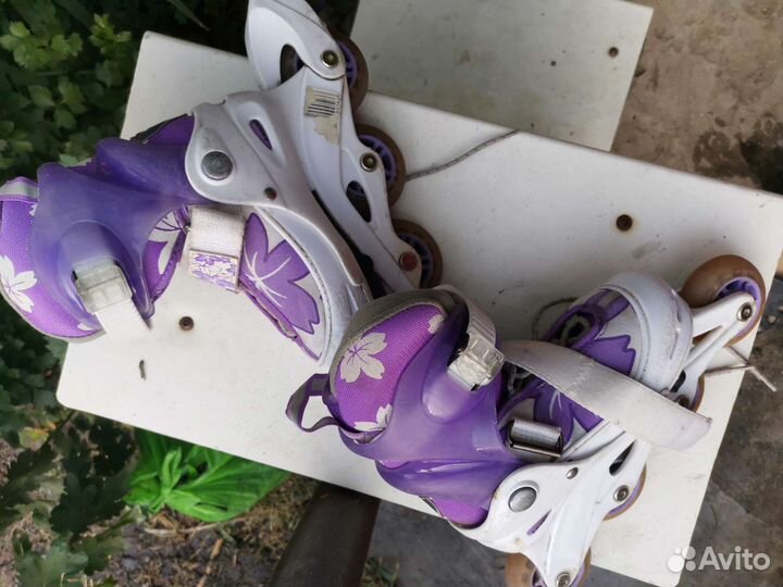 Роликовые коньки