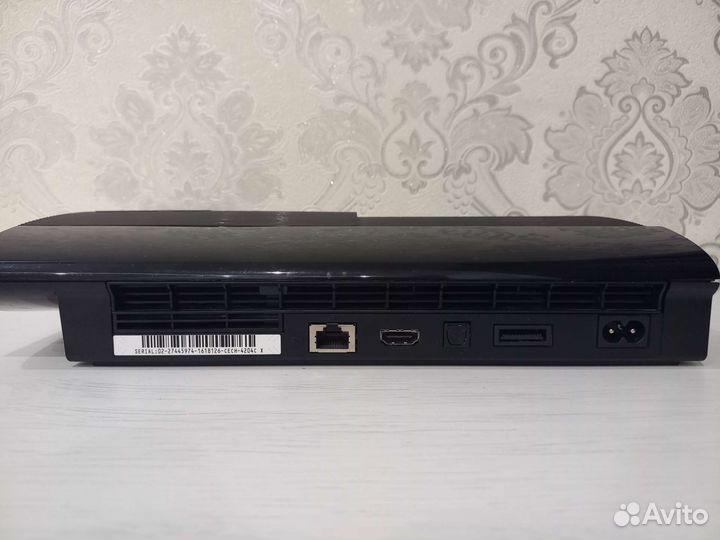 Sony playstation 3 super slim 500gb + 4 игры