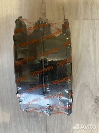 Nisshinbo передние колодки Toyota Corolla е150