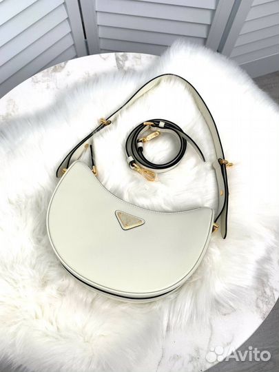 Кожаная мини сумка Prada