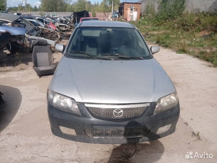 Решетка радиатора Mazda 323 BJ