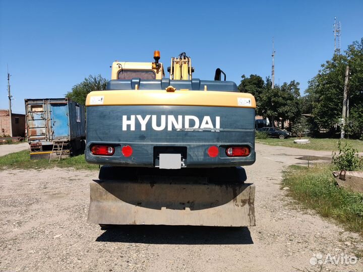 Колёсный экскаватор Hyundai R180W-9S, 2014