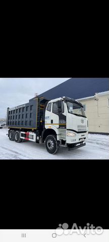 Водитель самосвала FAW