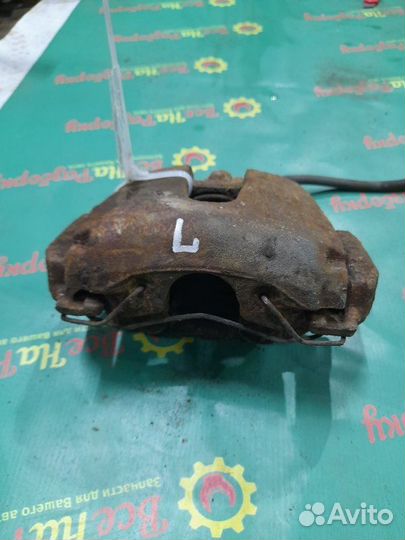 Суппорт передний левый Ford Focus 2 седан 1.8