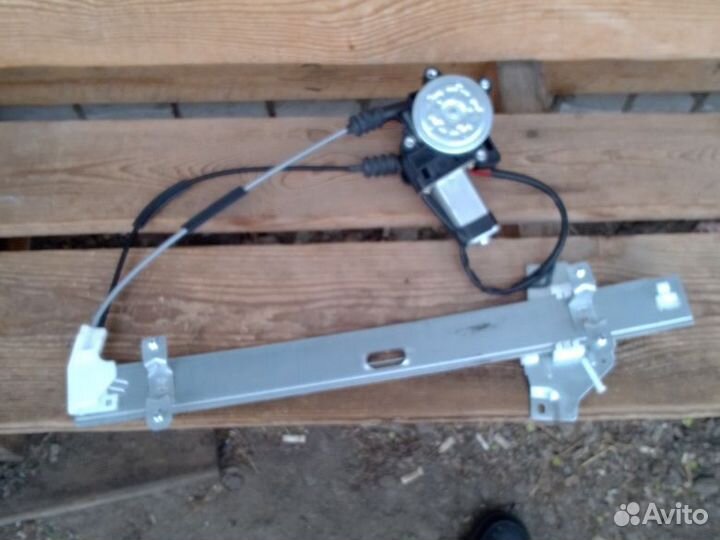 Кия Спектра Стеклоподъемник передний 0K2A359560C