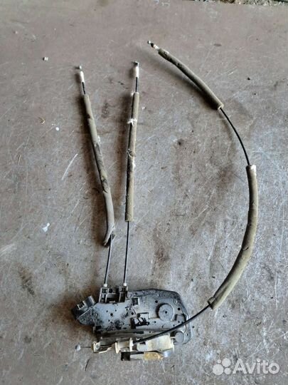 Замок двери передний левый Nissan Teana