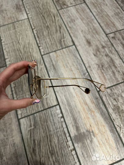 Солнцезащитные очки Gucci