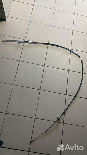 Трос ручного привода тормоза задний Chevrolet Niva