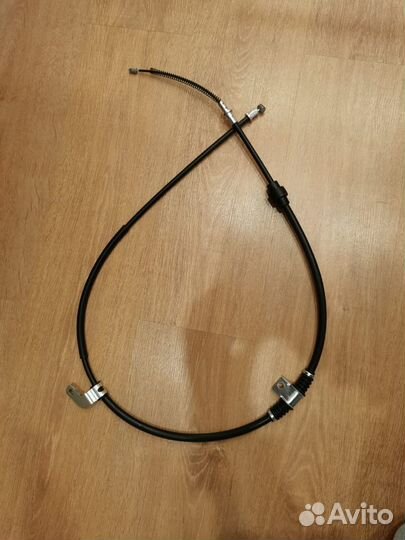 Трос стояночного тормоза