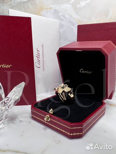 Золотое кольцо Panthere DE Cartier с ониксами и из