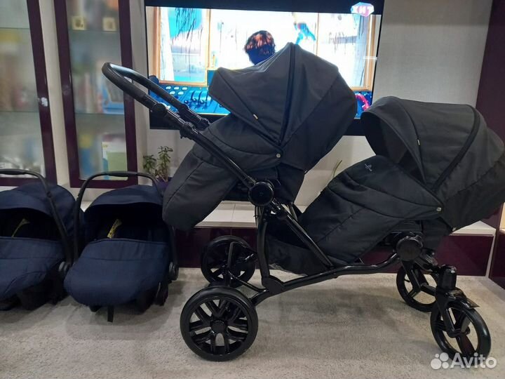 Детская коляска для двойняшек