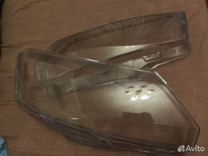 Стекла фар на skoda rapid