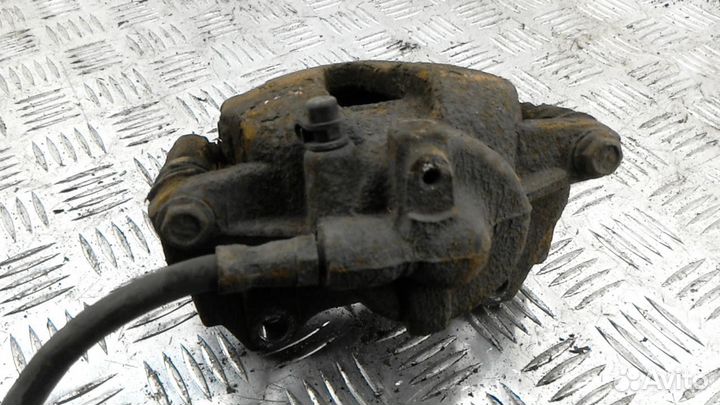 Суппорт передний левый Opel Corsa D рест. 2011