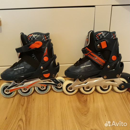 Роликовые коньки