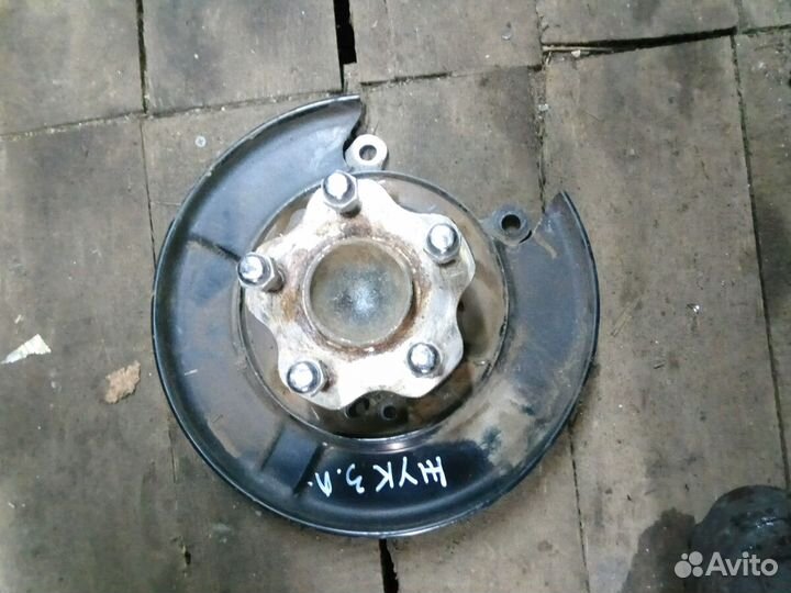 Ступица задняя левая Ниссан Жук