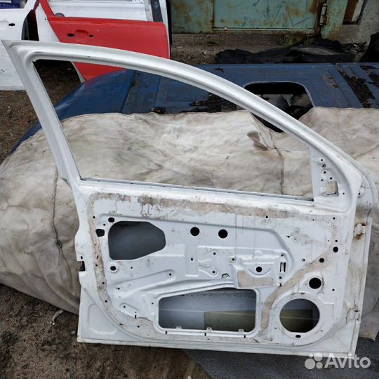 Дверь Opel Astra H