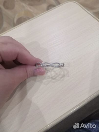 Серебряное кольцо на два пальца