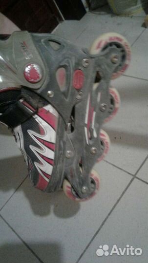 Роликовые коньки