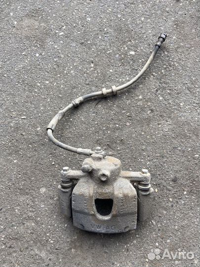 Суппорт тормозной правый Skoda Rapid