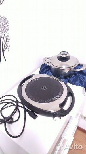 Плита Навигенио и кастрюля амс