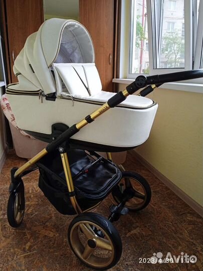 Коляска адамакс