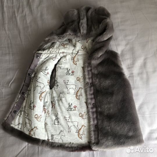 Меховая жилетка next