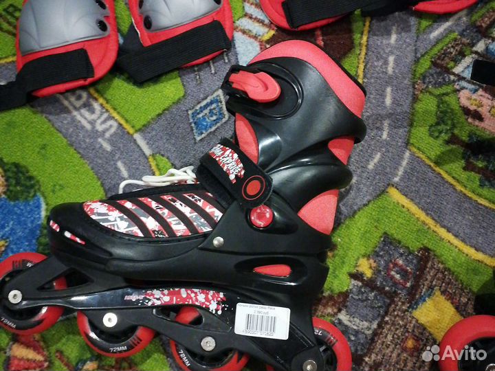 Роликовые коньки