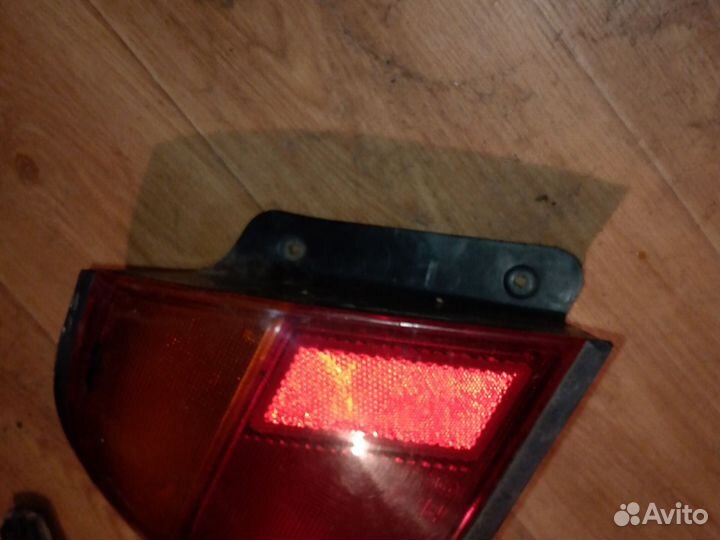 Фонарь задний левый Мазда 323 ba