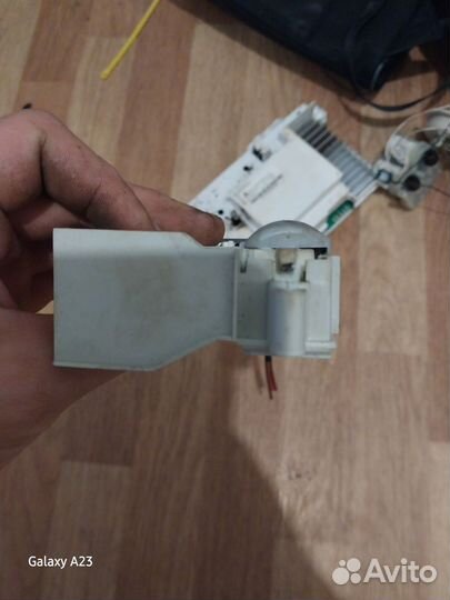 Устройство блокировки люка Hotpoint-Ariston