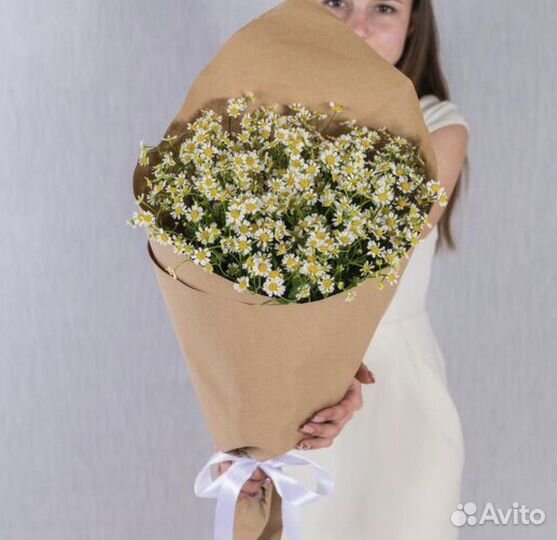 Букет из полевых ромашек в крафте