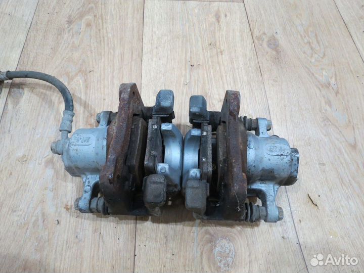 Суппорт задний Toyota Camry 55