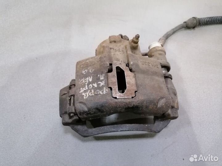 Суппорт тормозной передний левый Ford Escort 1989г