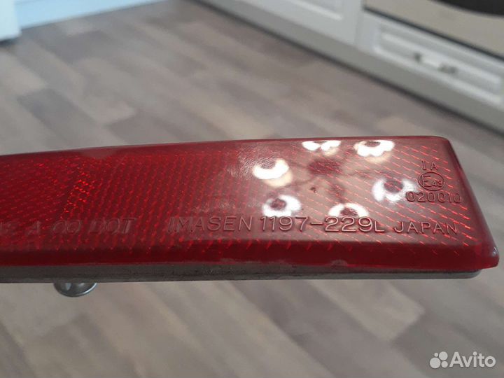 Катафот бампера задний левый Mitsubishi Lancer 10