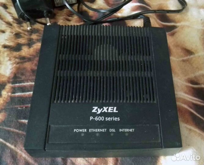 Модем zyxel P600