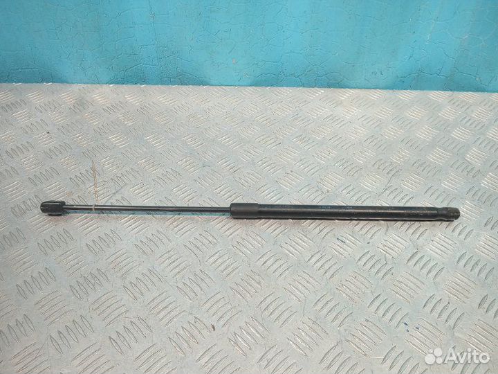 Амортизатор капота Opel Astra H