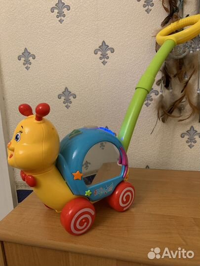 Каталки улитка и гусеница музыкальные игрушки