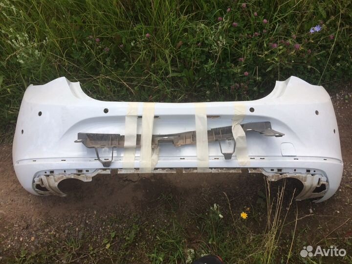 Задний бампер Opel Astra j
