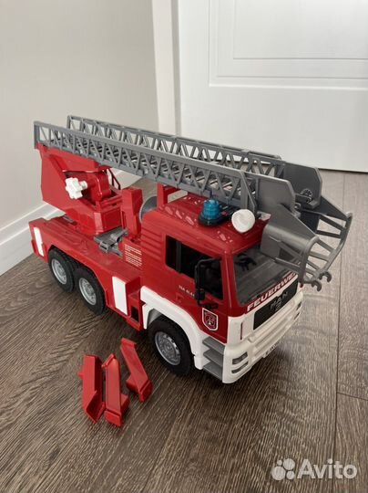Машина пожарная Bruder MAN звук свет
