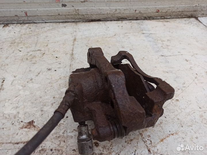 Суппорт передний левый