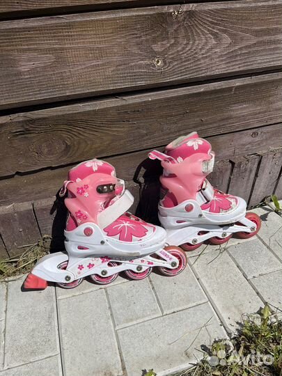 Роликовые коньки