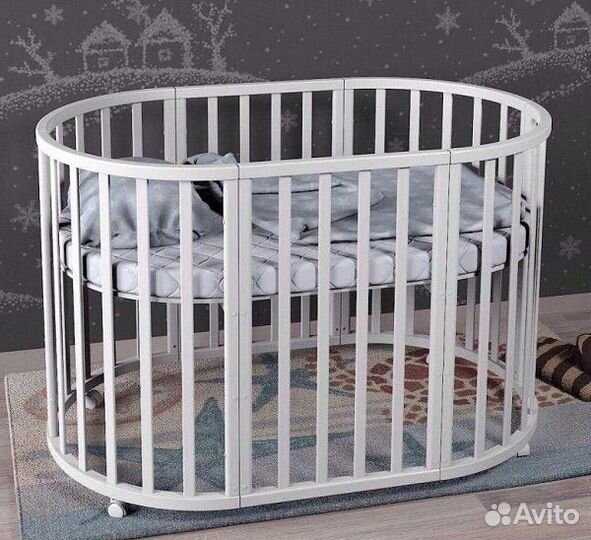 Детская кроватка с маятником