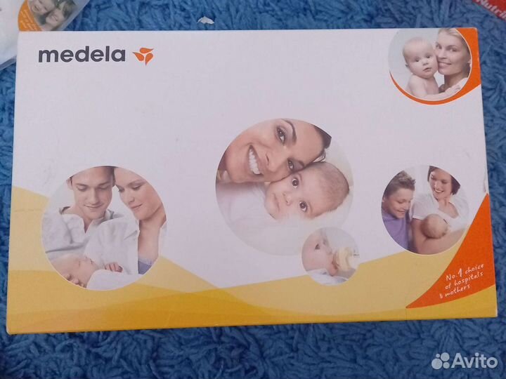 Молокоотсос medela ручной