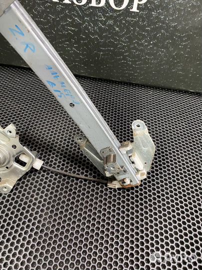 Стеклоподьемник задний правый almera g15